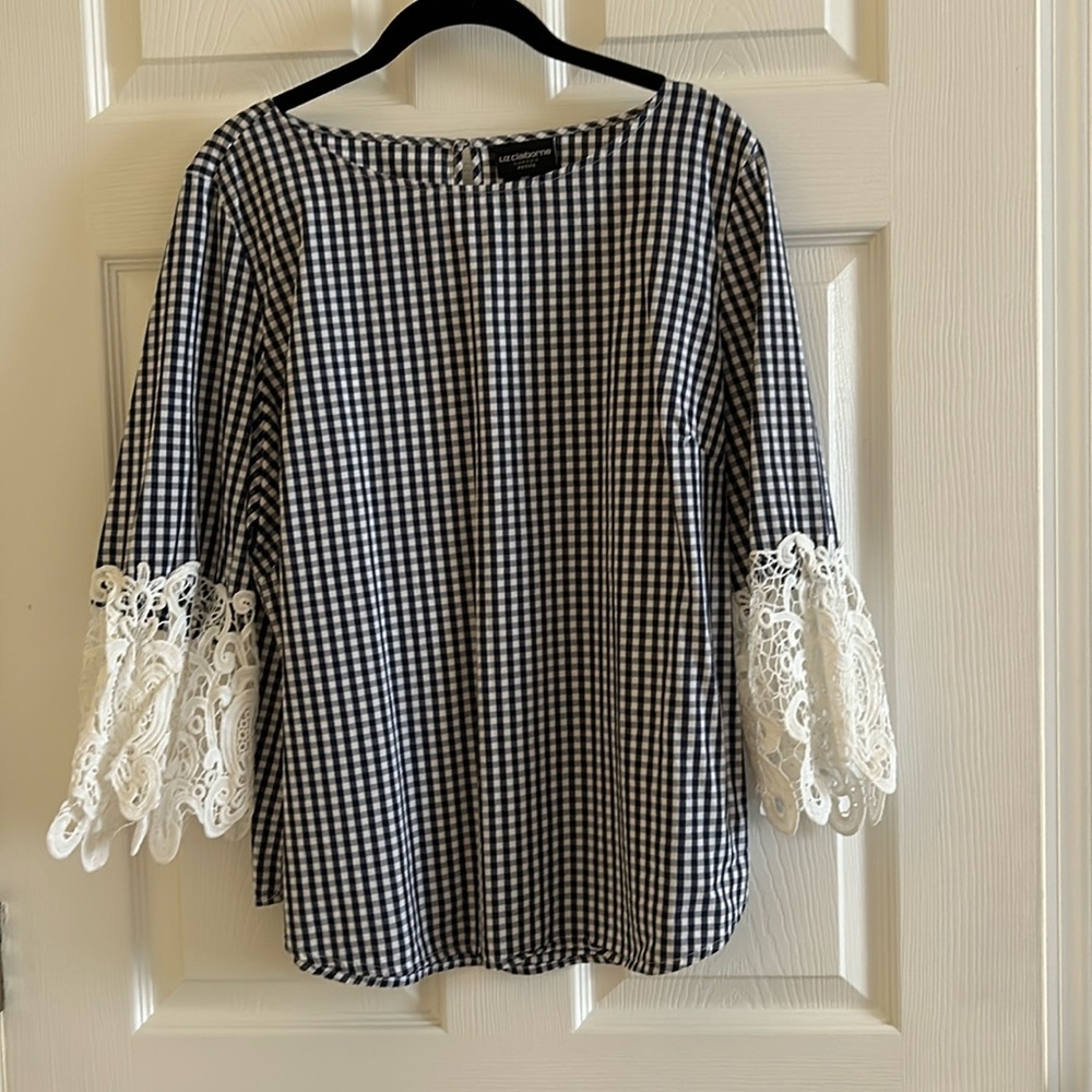Blue and white blouse with lace sleeves